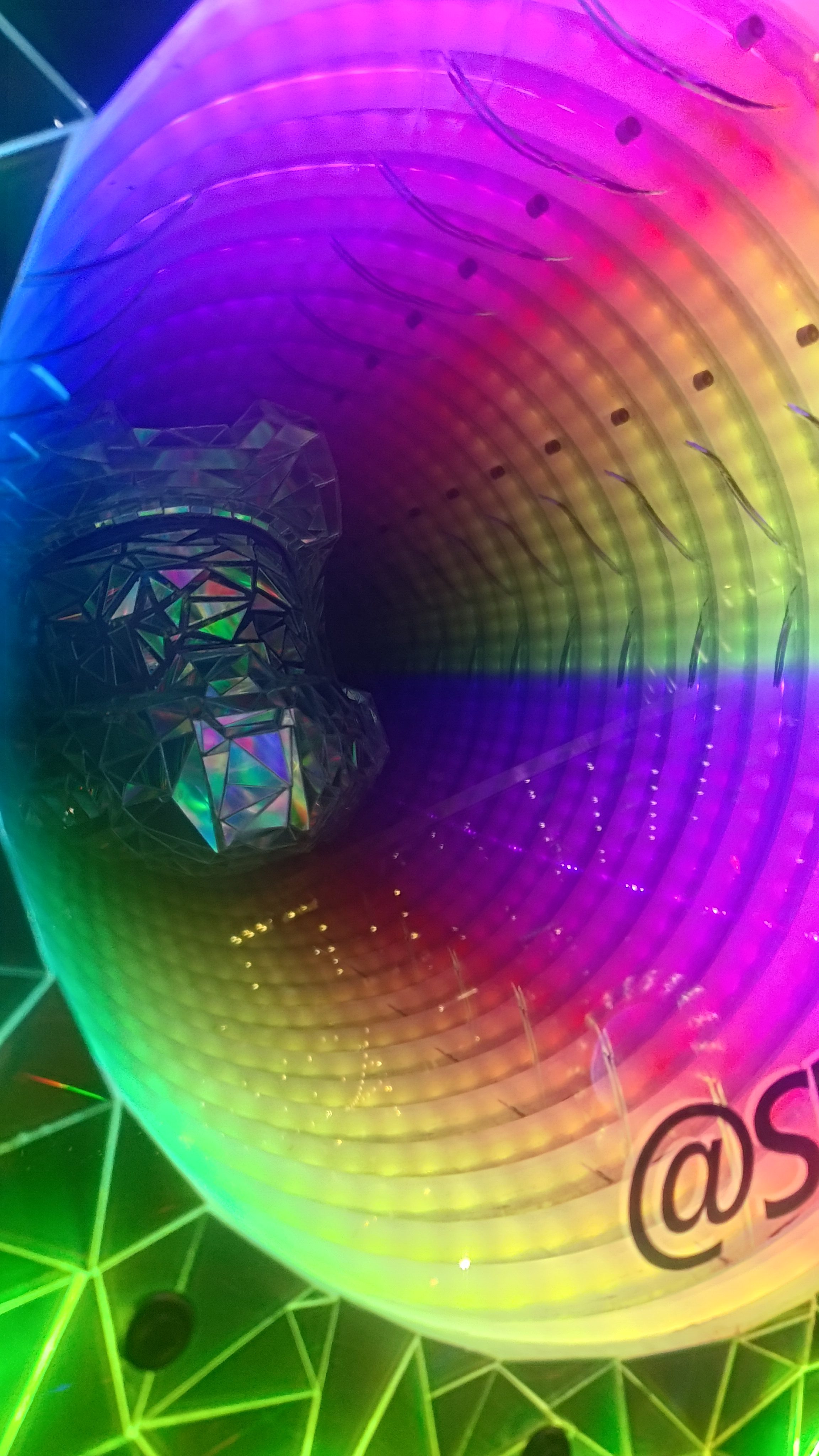 Close-up of the Disco Chief shield, its face a ring of rainbow LEDs around a glowing disc.