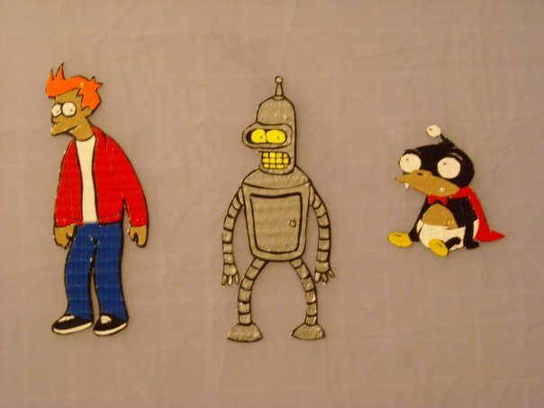 Duct tape portraits of Futurama characters mounted on a wall.